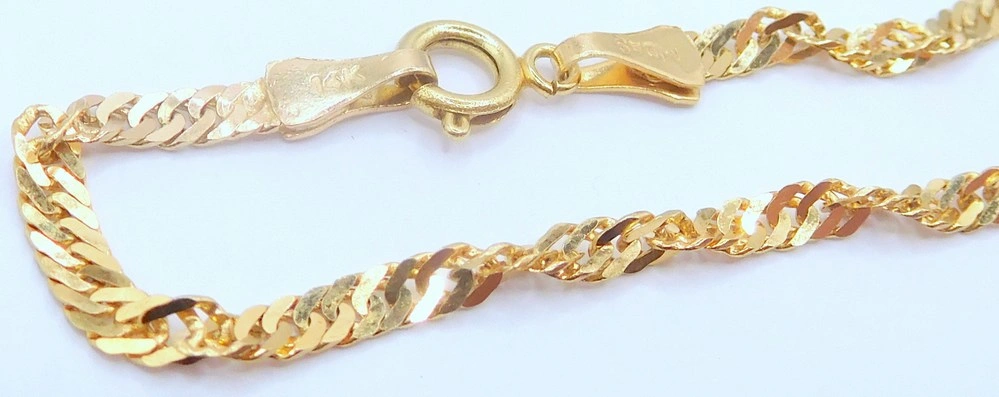 Klenoty Budín Dámský mohutný zlatý náramek TWIST 585/2,62gr 20cm HK7175