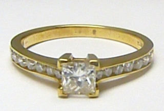 Klenoty Budín Luxusní mohutný zásnubní prsten s diamanty (14x0,35ct a 1x0,36ct) 585/2,85g 3810228